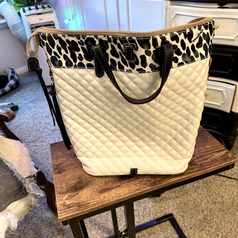 Consuela blue jag sling.